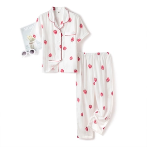Short sleeve cotton pajama set with cute strawberry print and red piping on white fabric