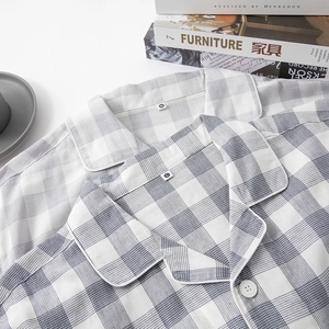 Men's cotton long-sleeved plaid pajama set in grey and blue with soft texture