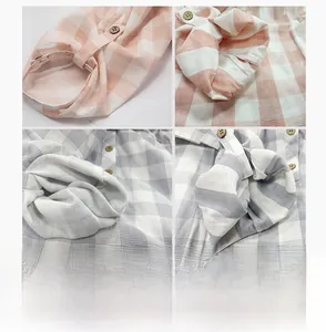 Dettaglio del tessuto a quadri in cotone rosa e grigio con bottoni in legno e fodera