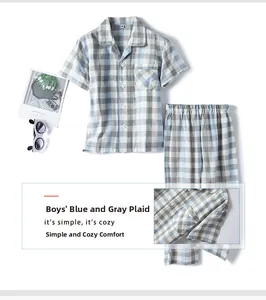 Détails du pyjama en coton à carreaux bleu et gris pour garçons montrant la poche et les finitions