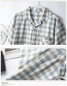 Détail de pyjama en coton à carreaux bleu et gris avec manches courtes et col boutonné