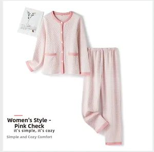 Detail of pink houndstooth cotton pajama set for women with front pockets and trim