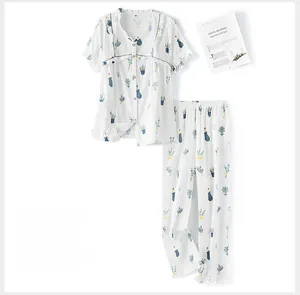 Detail of cotton pajama set featuring green potted plant prints and ruffled sleeve cuffs
