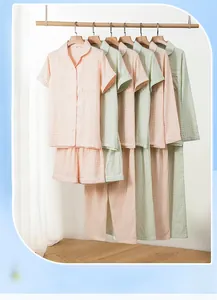 Detail of plaid cotton pajamas showing short-sleeved shirts and button-down pocket design