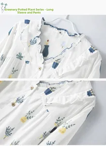 Detail of V-neck with blue lace trim and wooden buttons on cotton pajama set