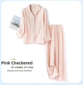 Pink checkered cotton pajama set with long sleeves and pants in a simple cozy style
