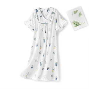 Short sleeve cotton nightgown with V-neck, ruffle trim and green potted plant patterns