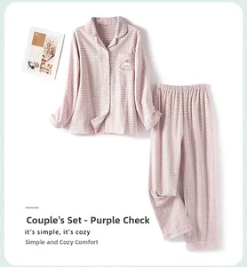Detail of purple plaid cotton pajama set featuring a cute cartoon bear embroidery on pocket