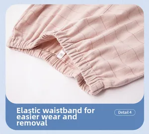 Détail du pantalon de pyjama à carreaux roses avec taille élastique et coton doux