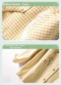 Detail of floral embroidery on yellow plaid pajamas with wood button and ruffle pocket