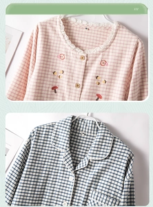 Detail of embroidered fruit patterns and lace collar on cotton flannel pajamas
