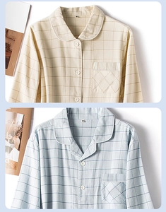 Détail de pyjamas en coton à carreaux avec col tailleur, boutons et poche poitrine