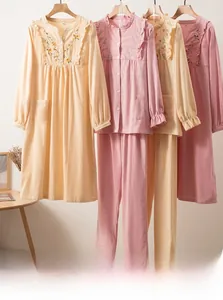 Detail of floral embroidery and ruffled trim on premium cotton loungewear set