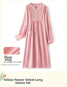 Detail of floral embroidery and ruffled V-neck on soft pink fleece loungewear set