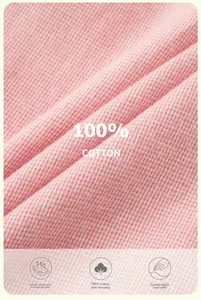 Détail macro du tissu 100% coton rose montrant une texture douce et respirante enfant