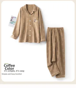 Detail of coffee brown quilted pajama set with cute rabbit prints and piping on the pocket