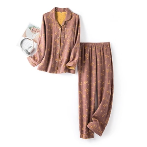 Women's pink floral cotton gauze pajama set with long sleeves and piping details