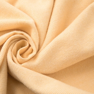 Soft apricot cotton fabric with fine grid texture for elegant loungewear and sleepwear