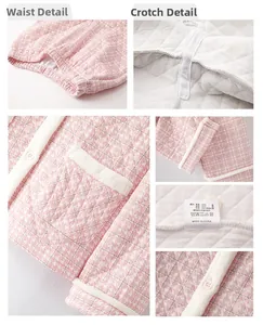 Detail view of pink houndstooth quilted pajamas showing waistband and seam craft
