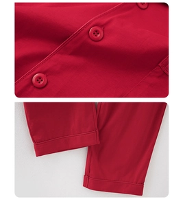 Detailed view of red cotton pajamas featuring neat buttons and high-quality hem stitching