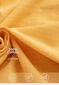 Macro view of 100% cotton yellow gauze fabric showing soft texture and breathable weave