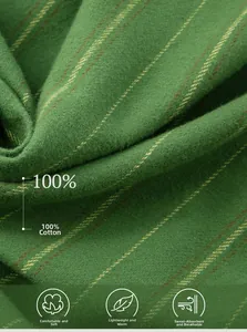 Macro shot of 100% cotton green striped pajama fabric with soft brushed texture