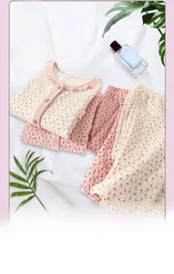Detailed quilted texture and floral pattern of long-sleeved warm cotton pajama set