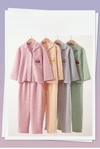 Detail of children's air layer pajamas set featuring quilted fabric and cute embroidery