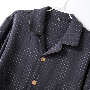 Men's dark gray quilted pajama set with geometric dots and classic wooden buttons