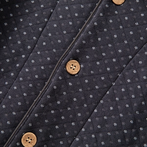 Men's navy blue quilted loungewear set with white polka dots and wood-texture buttons