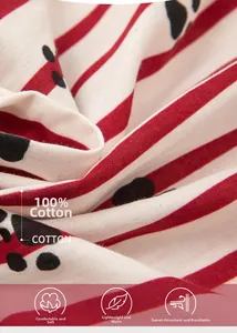 Detail of 100% cotton fabric with red stripes and black polka dots for women pajamas