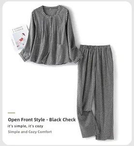 Detail of gingham cotton pajamas featuring a button-up shirt and elastic pants