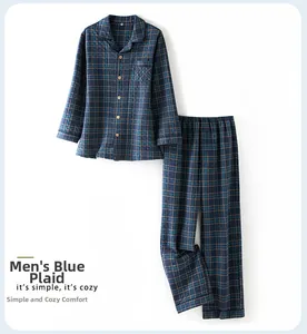 Close-up of men's blue plaid pajama set with button collar and soft quilted fabric