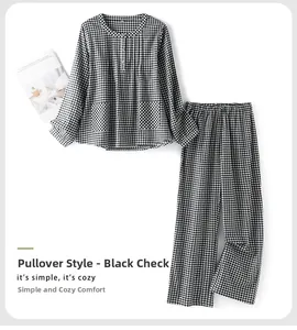 Detailed flat lay of black and white checkered cotton pajamas with dual front pockets