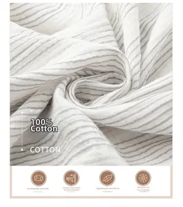 Macro shot of 100% cotton double gauze fabric with grey stripes and breathable texture