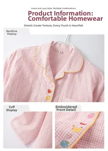 Détail de pyjama enfant à carreaux roses avec broderie de fruits et coton doux