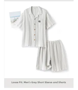 Detailed view of men's grey striped cotton crepe pajama set with panda embroidery
