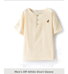 Detail of off-white men's cotton sleep shirt with Henley neck and fox embroidery
