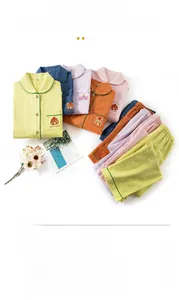 Detail of soft brushed cotton pajama sets in multiple colors with cute pocket embroidery