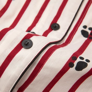 Women's cotton striped pajama set with cat paw print, buttons and black piping detail