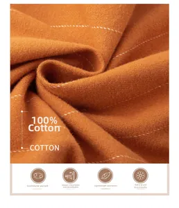 Detail of soft orange striped cotton fabric texture with 100 percent cotton quality