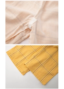 Detailed stitching and reinforced seams on cotton gauze plaid pajama pants fabric
