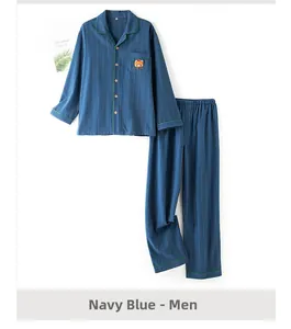Navy blue striped men's cotton pajama set with bear embroidery and green piping trim