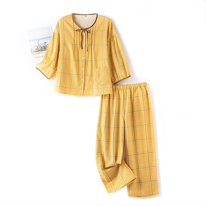 Yellow plaid cotton pajama set with button-up top and matching lounge pants