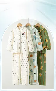 Detail view of children's air layer quilted thermal pajamas with animal embroidery