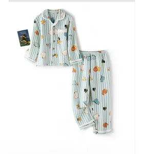 Detail of blue striped children pajamas with cute cartoon animal prints and lapel collar