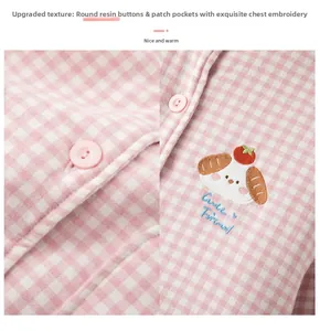 Detail of pink plaid quilted loungewear showing resin buttons and Cute Friend embroidery