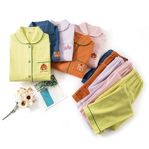 Matching cotton waffle pajamas set for kids featuring bear embroidery and soft textures