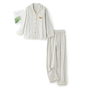 Minimalist striped cotton pajama set with dachshund embroidery and yellow trim detailing