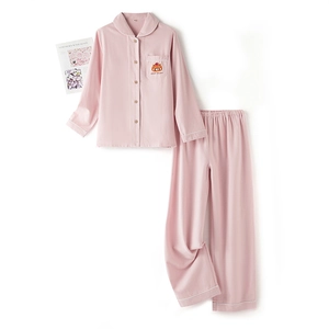 Pink cotton embroidered pajamas set for couples featuring bear pattern and long sleeves